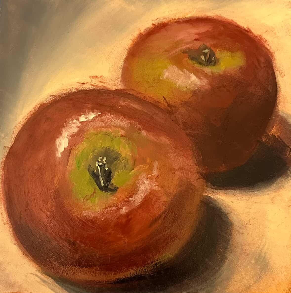 Oil painting still life of two red apples with warm light and cast shadows